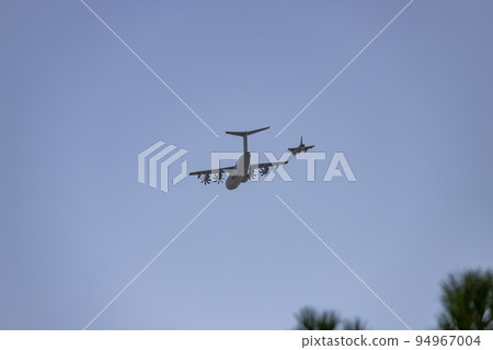Hunt. Airplane. Military vehicle. Spanish Air Force rehearsing for the National Day of October 12 through the streets of the city of Madrid. MADRID, SPAIN - OCTOBER 5, 2022. 94967004