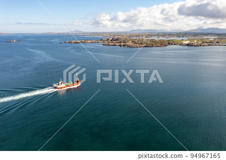 The red Arranmore ferry leaving the Island towards Burtonport, County Donegal, Ireland 94967165