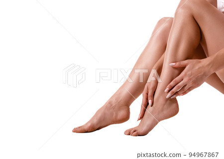 Long pretty woman legs, isolated on white. Long pretty woman legs, isolated on white. 94967867