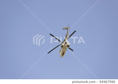 Helicopter. Spanish Air Force rehearsing for the National Day of October 12 through the streets of the city of Madrid. MADRID, SPAIN - OCTOBER 5, 2022. 94967990