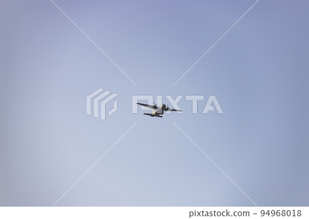 Helicopter. Spanish Air Force rehearsing for the National Day of October 12 through the streets of the city of Madrid. MADRID, SPAIN - OCTOBER 5, 2022. Helicopter. Spanish Air Force rehearsing for the National Day of October 12 through the streets of the city of Madrid. MADRID, SPAIN - OCTOBER 5, 2022. 94968018