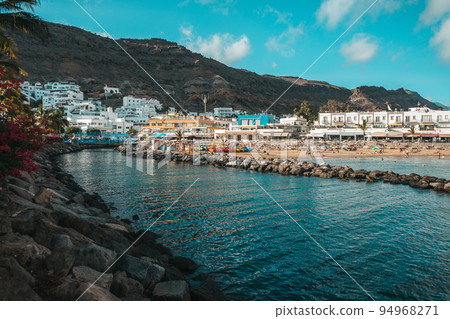 Pintoresque village on volcanic terrain 94968271