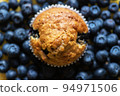 Blueberry muffin on a bluberries. Top view. 94971506