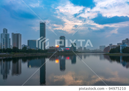 Sunset on a pond in the center of the city. Yekaterinburg, Russia Sunset on a pond in the center of the city. Yekaterinburg, Russia 94975210
