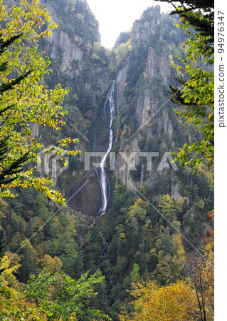 Ginga Falls in Sounkyo in autumn 94976347