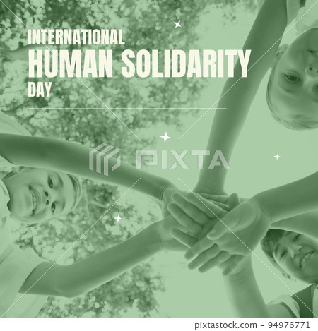 Composition of international human solidarity day text over diverse children hand stacking 94976771