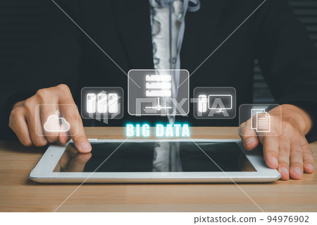 Big data concept, Person hand touching digital tablet with big data icon on vr screen on dark background Big data concept, Person hand touching digital tablet with big data icon on vr screen on dark background 94976902