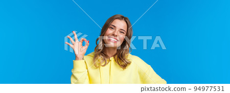 Count on me. Confident good-looking blonde european female student guarantee all good, show okay confirmation gesture, give approval, review excellent movie, smiling satisfied Count on me. Confident good-looking blonde european female student guarantee all good, show okay confirmation gesture, give approval, review excellent movie, smiling satisfied 94977531