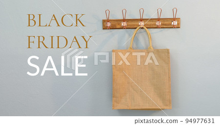 Composition of black friday sale text over brown shopping bag in background 94977631