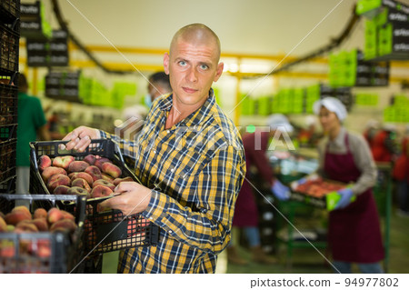 male employee working at warehouse male employee working at warehouse 94977802