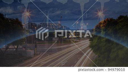 Image of night traffic and people silhouettes over sun appearing over globe Image of night traffic and people silhouettes over sun appearing over globe 94979010