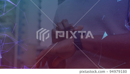 Image of networks of connections over man using smartwatch in background 94979180