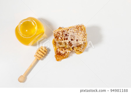 honeycomb, bottled honey, honey dipper stick 94981188