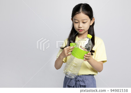 Korean young girl wearing gym clothes in white background studio__separation of plastic bottle labels Korean young girl wearing gym clothes in white background studio__separation of plastic bottle labels 94981538