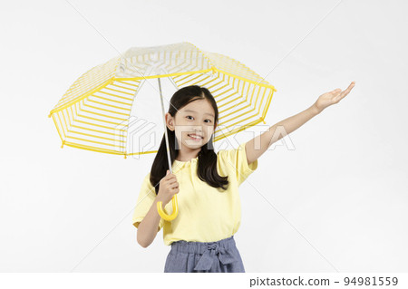 cute young Korean girl, rainy season concept in white background studio__holding an umbrella and reaching out out cute young Korean girl, rainy season concept in white background studio__holding an umbrella and reaching out out 94981559