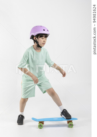 Korean young girl wearing gym clothes in white background studio__skateboard 94981624