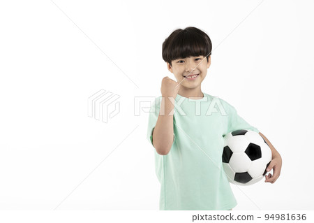 Korean young girl wearing gym clothes in white background studio__soccer ball Korean young girl wearing gym clothes in white background studio__soccer ball 94981636