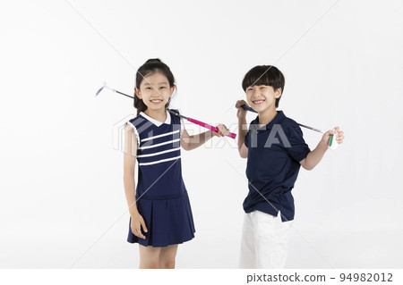 Korean boy and girl_fitness and exercise concept in white background__swinging golf club Korean boy and girl_fitness and exercise concept in white background__swinging golf club 94982012