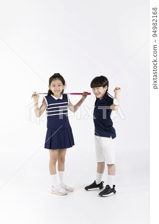 Korean boy and girl_fitness and exercise concept in white background__swinging golf club Korean boy and girl_fitness and exercise concept in white background__swinging golf club 94982168