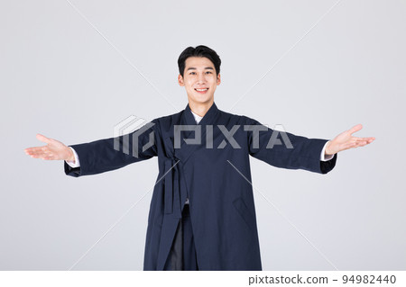 goodlooking Korean young man in 20s wearing modern Hanbok wearing hanbok_hand motion goodlooking Korean young man in 20s wearing modern Hanbok wearing hanbok_hand motion 94982440