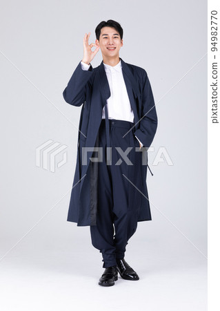 goodlooking Korean young man in 20s wearing modern Hanbok wearing hanbok_standing 94982770