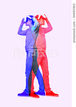 Man is using virtual reality headset. Image with double color exposure effect. 94985903