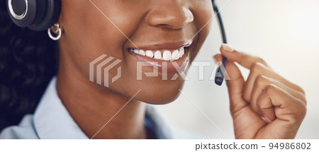 Smile, call center and mouth of black woman with headphone microphone for telemarketing, communication and customer support. Consultant, receptionist or customer service employee on phone call Smile, call center and mouth of black woman with headphone microphone for telemarketing, communication and customer support. Consultant, receptionist or customer service employee on phone call 94986802