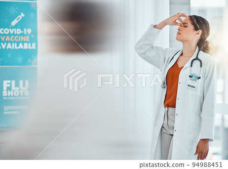 Stress, depression and tired covid female doctor working at vaccine station or hospital for healthcare and flu shots. Stressed, headache and burnout woman and medical practitioner for coronavirus 94988451