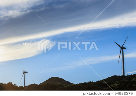 Blue sky and windmills before dusk 94988579