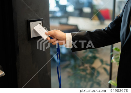 A man entering a high-security office faceless 94988678