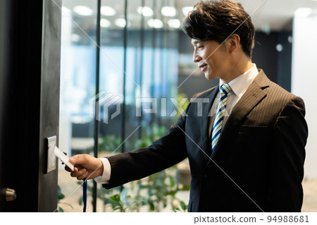 A man entering a high security office 94988681