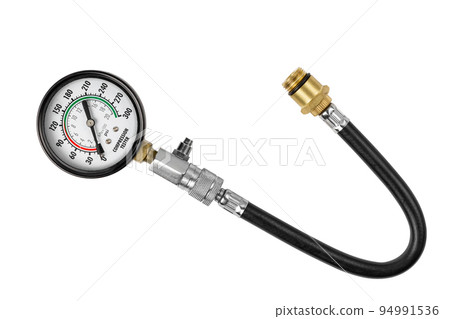 Engine compression gauge isolated on white background. Engine compression measurement. Engine compression gauge isolated on white background. Engine compression measurement. 94991536