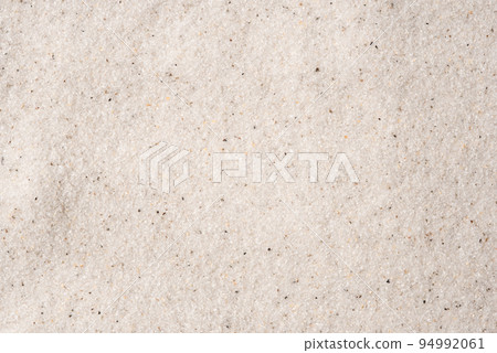 Natural background of white sand. Top view. 94992061