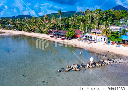 Aerial view of Hin Kong beach and its sand bank, in Koh Pha Ngan, Thailand Aerial view of Hin Kong beach and its sand bank, in Koh Pha Ngan, Thailand 94993683