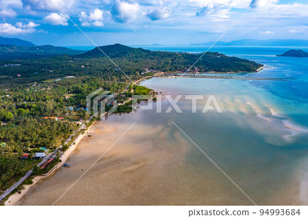 Aerial view of Hin Kong beach and its sand bank, in Koh Pha Ngan, Thailand Aerial view of Hin Kong beach and its sand bank, in Koh Pha Ngan, Thailand 94993684