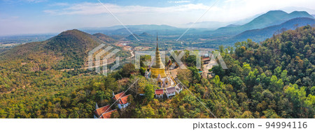 Aerial view of Wat Phra Phutthabat Tak Pha temple on top of the mountain in Lamphun, Thailand Aerial view of Wat Phra Phutthabat Tak Pha temple on top of the mountain in Lamphun, Thailand 94994116