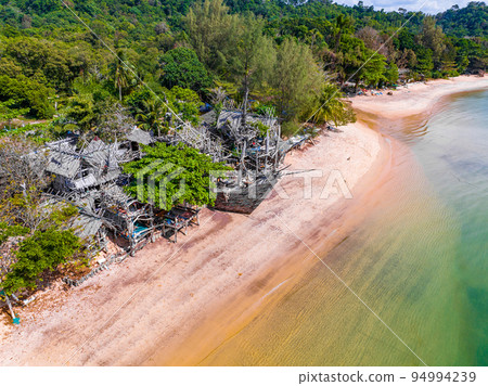 Old wooden pirate boat on the beach in Koh Phayam, Ranong, Thailand Old wooden pirate boat on the beach in Koh Phayam, Ranong, Thailand 94994239