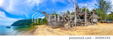 Old wooden pirate boat on the beach in Koh Phayam, Ranong, Thailand 94994344