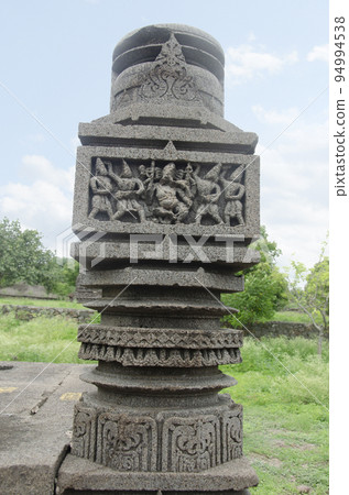 Carved pillar of the Baleshwar temple, one of the five rock temples inside Bahadurgad, Pedgaon, Taluka Shrigonda, Maharashtra, India 94994538