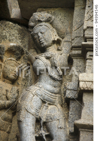 Sculptures carved on the outer wall of the Laxminarayana temple one of the five rock temples inside Bahadurgad, Pedgaon, Taluka Shrigonda, Maharashtra, India 94994546