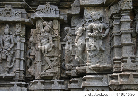 Sculptures carved on the outer wall of the Laxminarayana temple one of the five rock temples inside Bahadurgad, Pedgaon, Taluka Shrigonda, Maharashtra, India Sculptures carved on the outer wall of the Laxminarayana temple one of the five rock temples inside Bahadurgad, Pedgaon, Taluka Shrigonda, Maharashtra, India 94994550