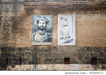Paintings of Chhatrapati Shivaji Maharaj and King Yashwant Rao Holkar on the outer wall of the Holkar Wada (fort), the birthplace of King Yashwant Rao Holkar, located at Wafgaon, near Pune, Paintings of Chhatrapati Shivaji Maharaj and King Yashwant Rao Holkar on the outer wall of the Holkar Wada (fort), the birthplace of King Yashwant Rao Holkar, located at Wafgaon, near Pune, 94994571