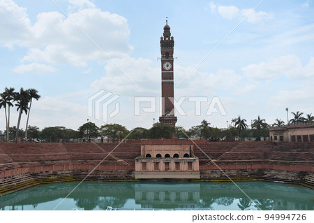 Husainabad Clock Tower - Ghanta Ghar and Talab - Pond with red stoned stairs constructed by Nawab Nasir-ud-din Haider in the year 1881. Lucknow, Uttar Pradesh 94994726