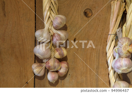 garlic on wood wall food ingredient healthy spice kitchen wood background garlic on wood wall food ingredient healthy spice kitchen wood background 94996487