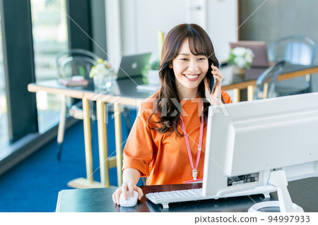 A young female engineer in the office 94997933