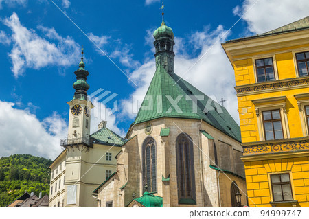 Town hall with St. Catherine's church in Banska Stiavnica. 94999747