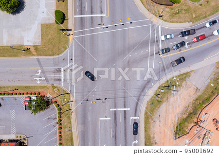 Traffic intersections are places where cars cross over each other Traffic intersections are places where cars cross over each other 95001692