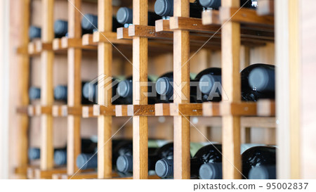 Homemade wine cellar with wooden boxes for storing bottles Homemade wine cellar with wooden boxes for storing bottles 95002837