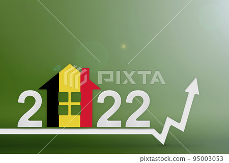 The cost of real estate in Belgium in 2022. Rising cost of construction, insurance, rent in Belgium. House model painted in the colors of the flag, up arrow on a green background 95003053
