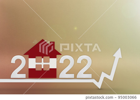 The cost of real estate in Latvia in 2022. Rising cost of construction, insurance, rent in Latvia. House model painted in flag colors, up arrow on yellow background 95003066